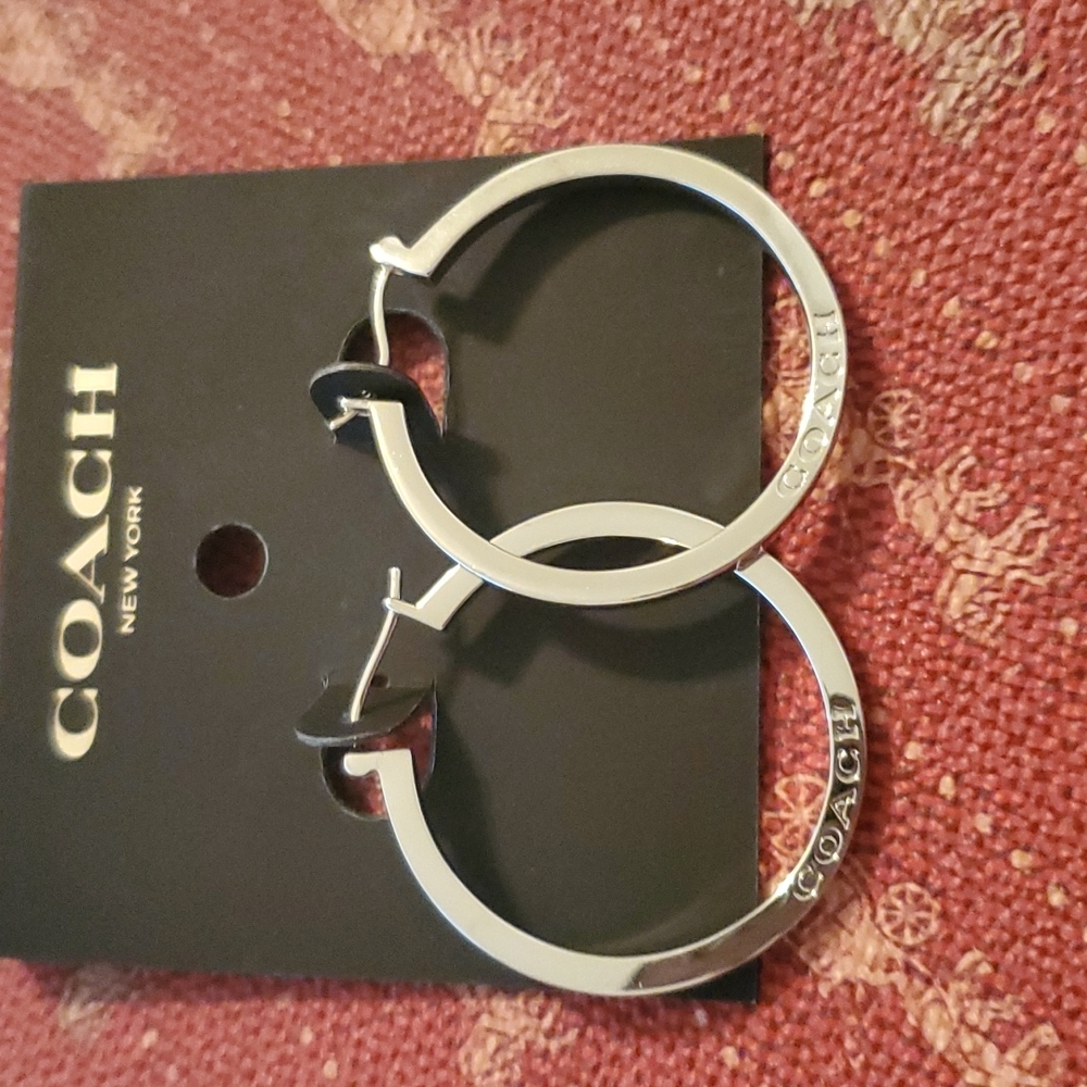 COACH SILVER MEDIUM THICK HOOP WITH COACH ETCHED IN THEM ON BOTH SIDES